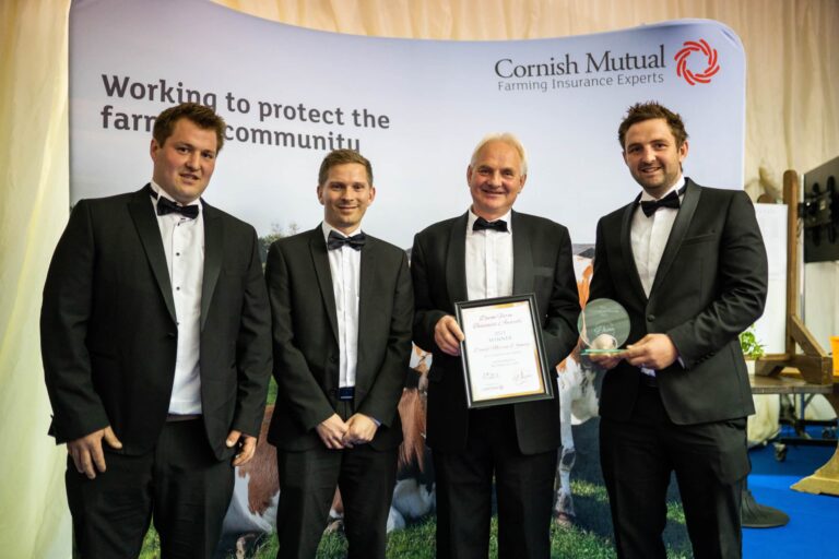 David Merrin and Family strike a pose after winning Best Commercial Farmers 2023 at the Devon Farm Business Awards.