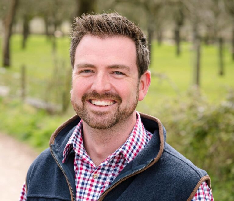 Headshot of James England.