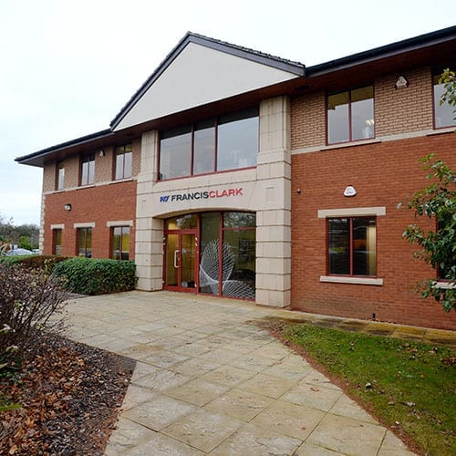 An Autumnal image of the pathway leading to the entrance of of the Taunton office.