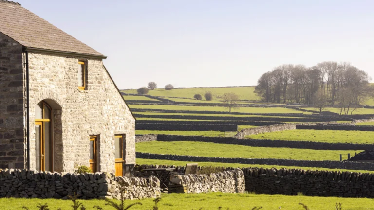 A farm house surrounded by fields