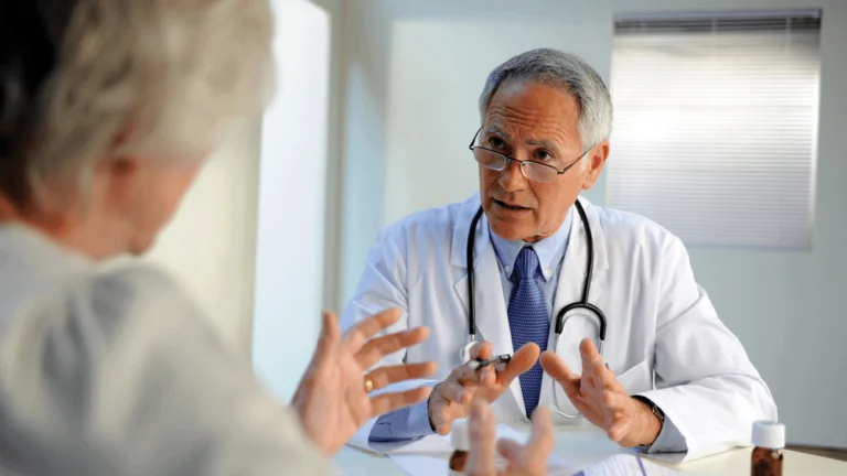 A patient explaining a problem to a doctor