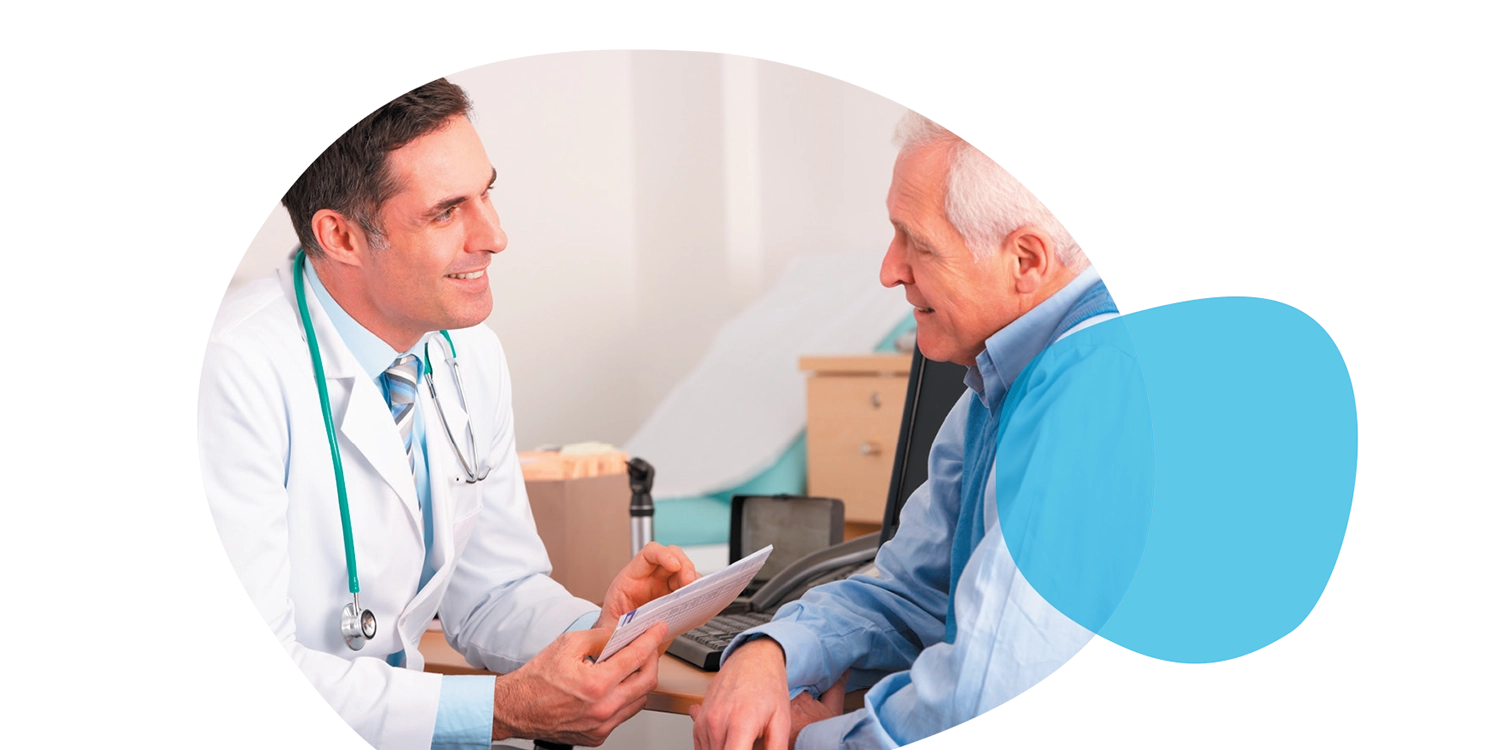 A patient discussing something medical with a doctor.