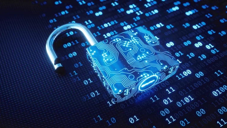 Padlock resting on a computer coding sheet