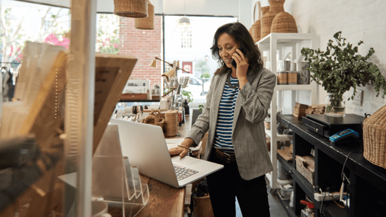 Female small business owner, working in her shop
