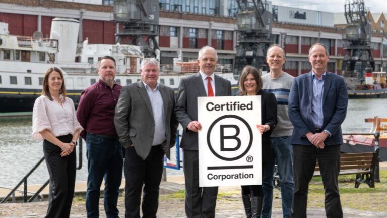 PKF Francis Clark colleagues celebrating our B Corp certification at Bristol harbourside